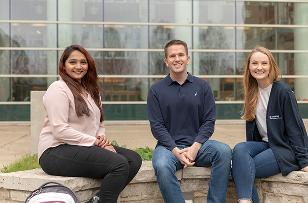 Gies students in courtyard